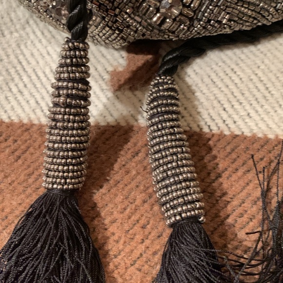 Beaded and jeweled bag with ties Long strap/cord.
Great bag Very decorative - Picture 6 of 6